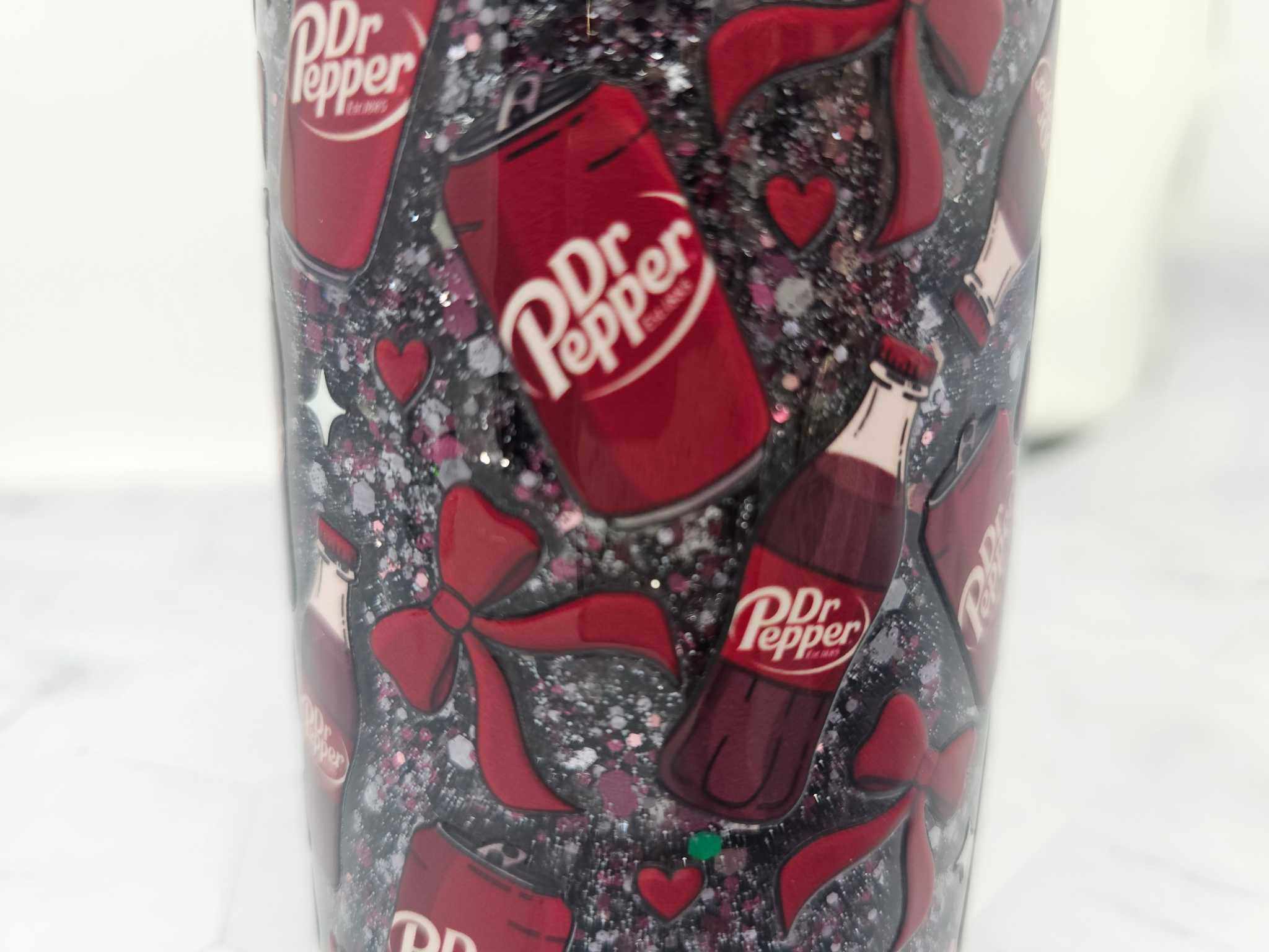 16 oz acrylic Snow Globe Tumbler with Dr. Pepper-themed glitter and decorative bows