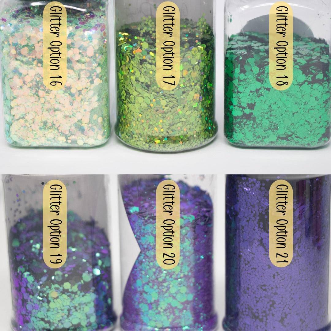 Custom snow globe tumbler with personalized glitter, lids, and add-ons