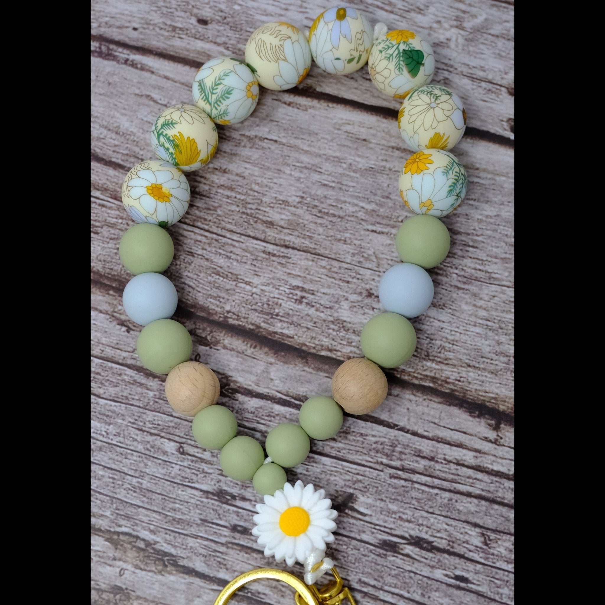 Beautiful daisy and floral beaded wristlet keychain with colorful silicone beads and gold lobster clasp