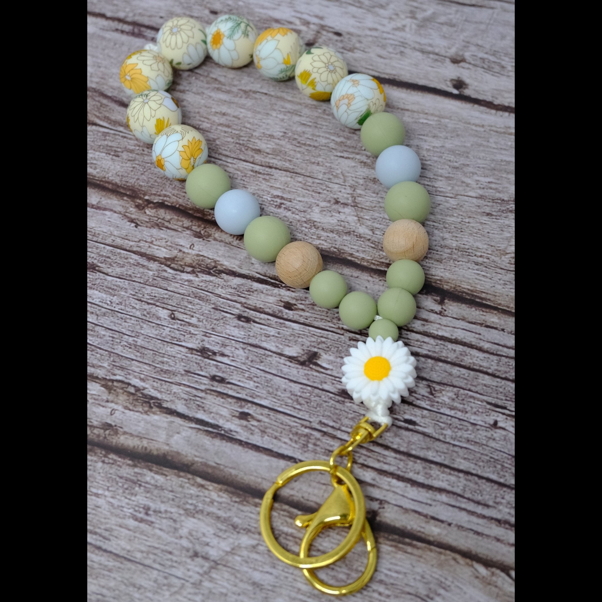 Beautiful daisy and floral beaded wristlet keychain with silicone beads and gold lobster clasp