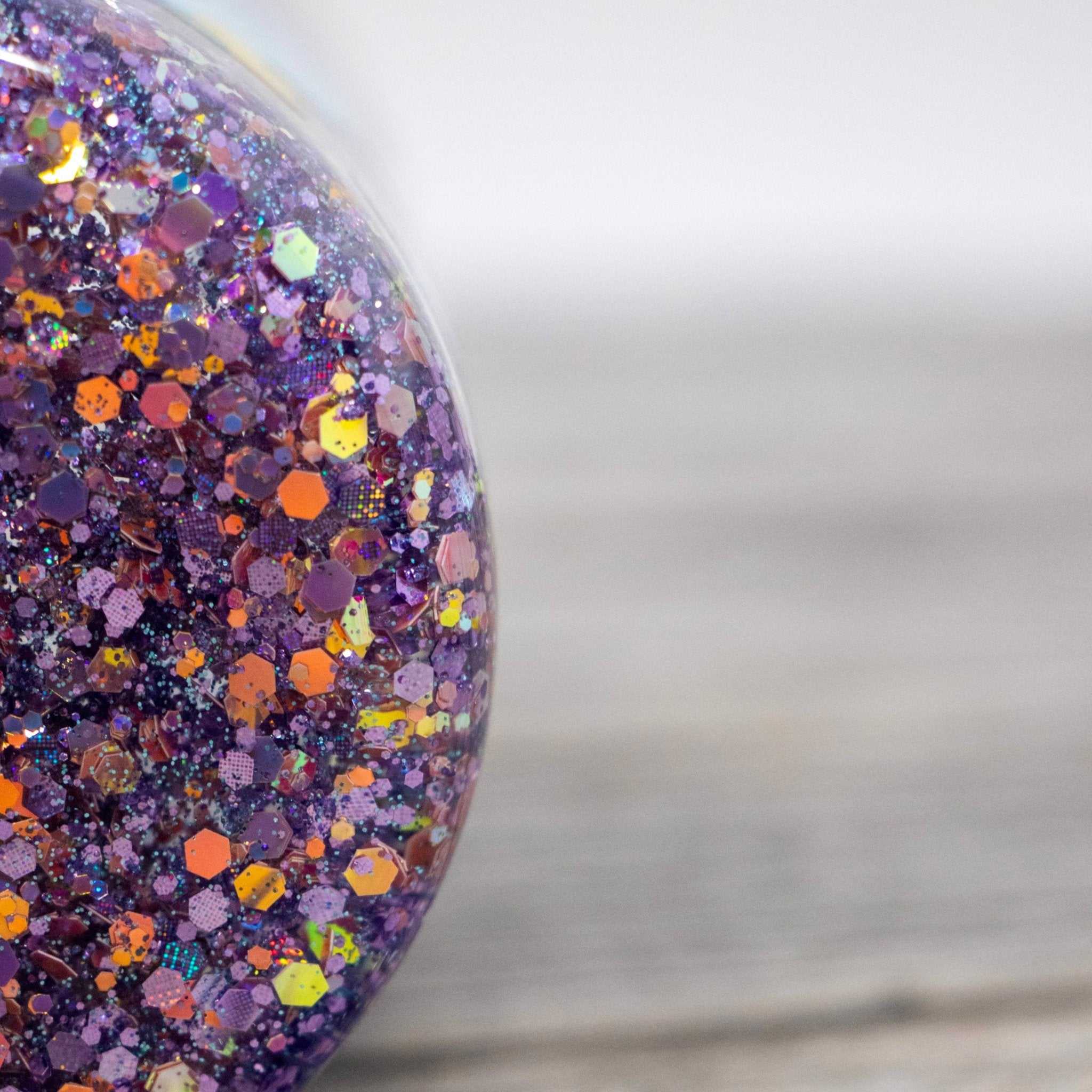 Best Mom Ever pink and purple glitter snow globe tumbler with heartfelt affirmation and slow-flow glitter design