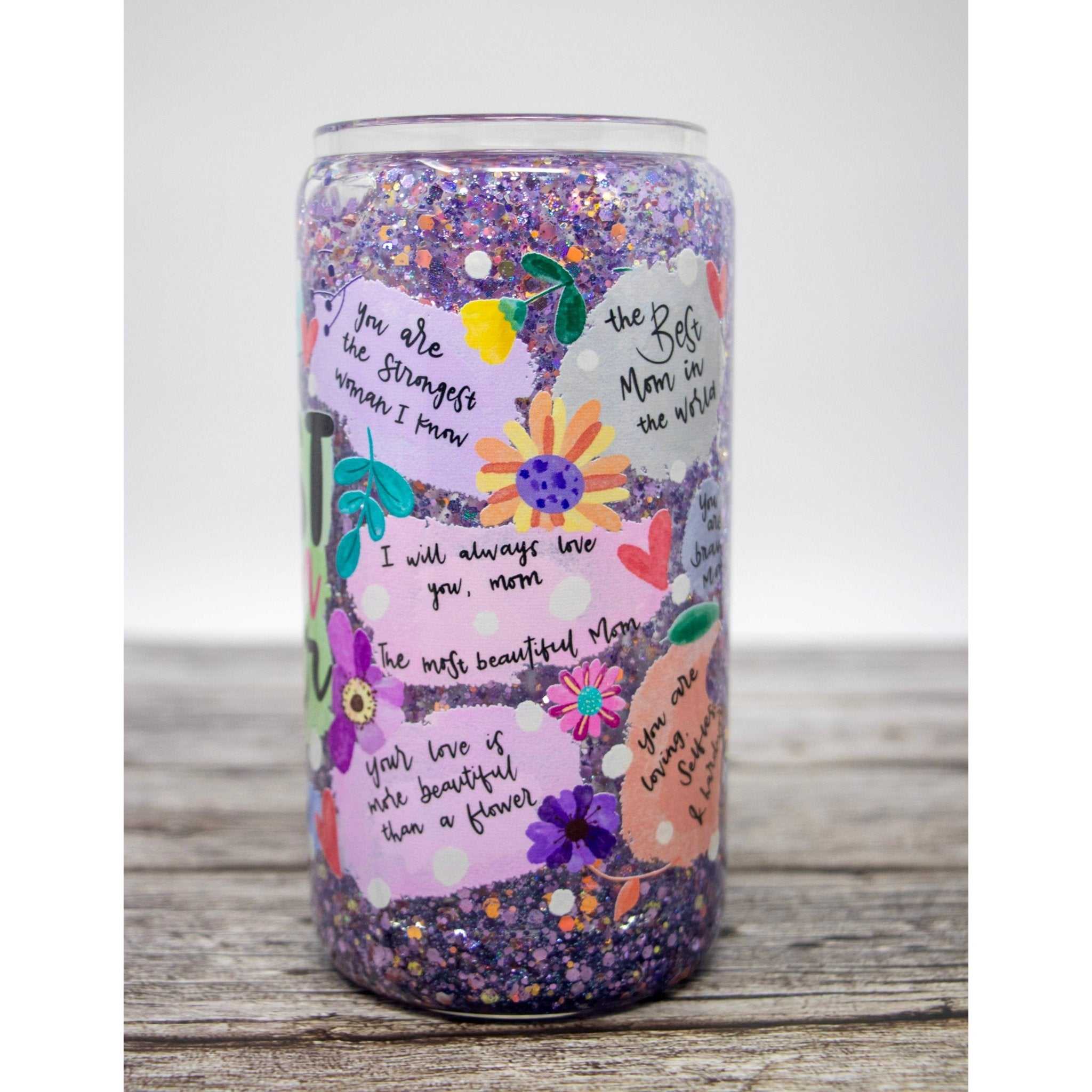 Best Mom Ever pink and purple glitter snow globe tumbler with raised loving message and slow-flow glitter design