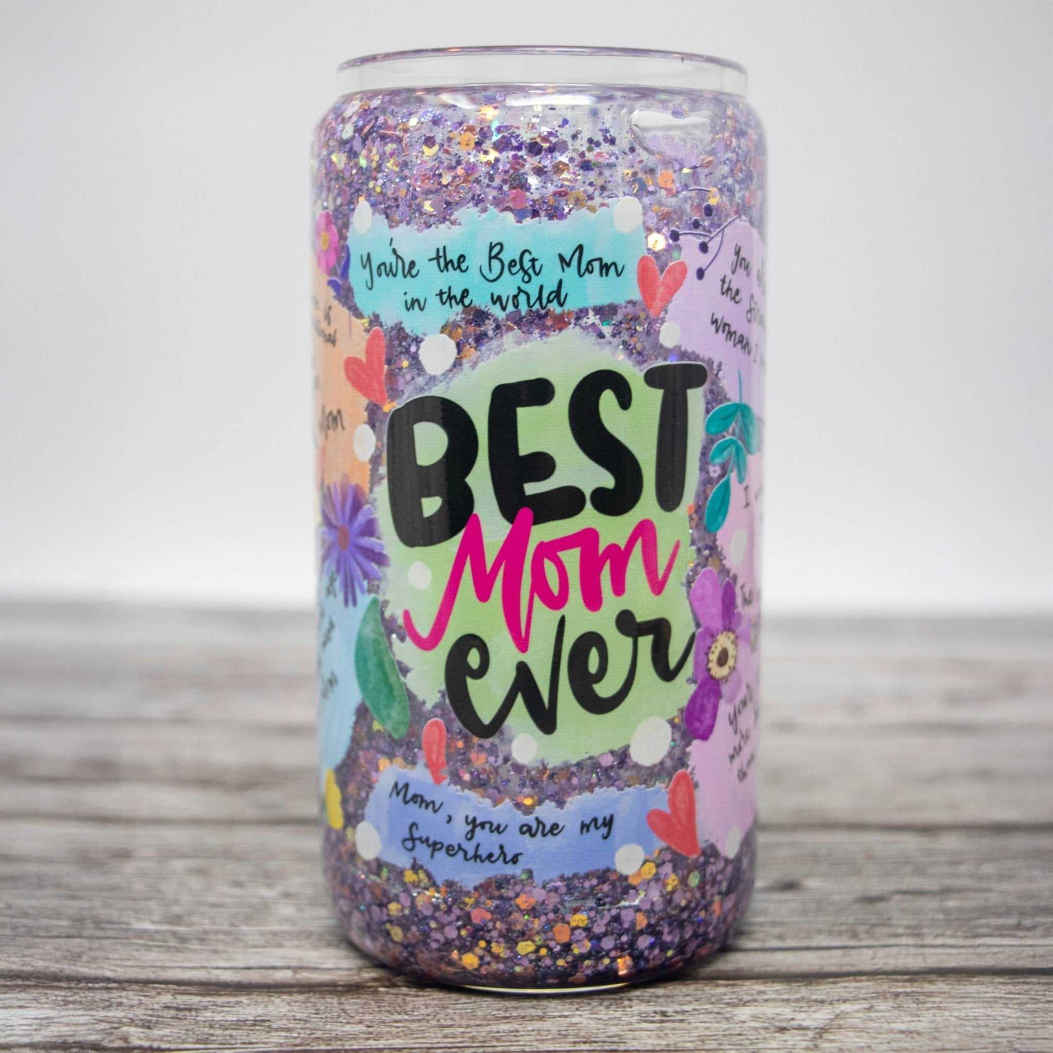 Best Mom Ever pink and purple glitter snow globe tumbler with heartfelt affirmation and slow-flow glitter design