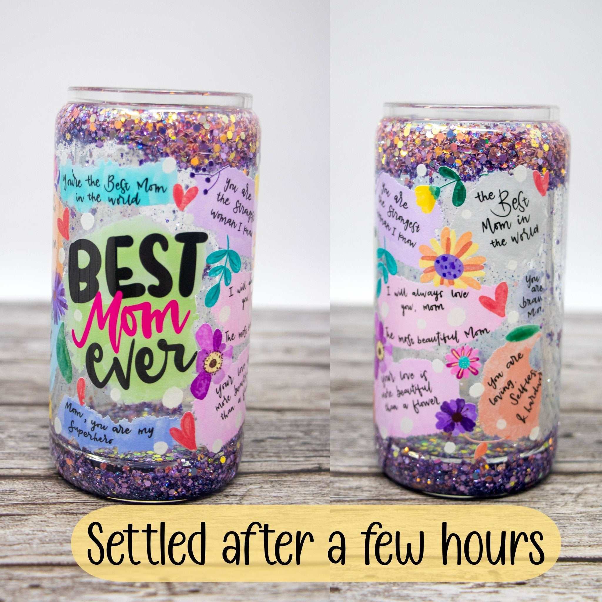 Best Mom Ever pink and purple glitter snow globe tumbler with heartfelt affirmation and slow-flow glitter design