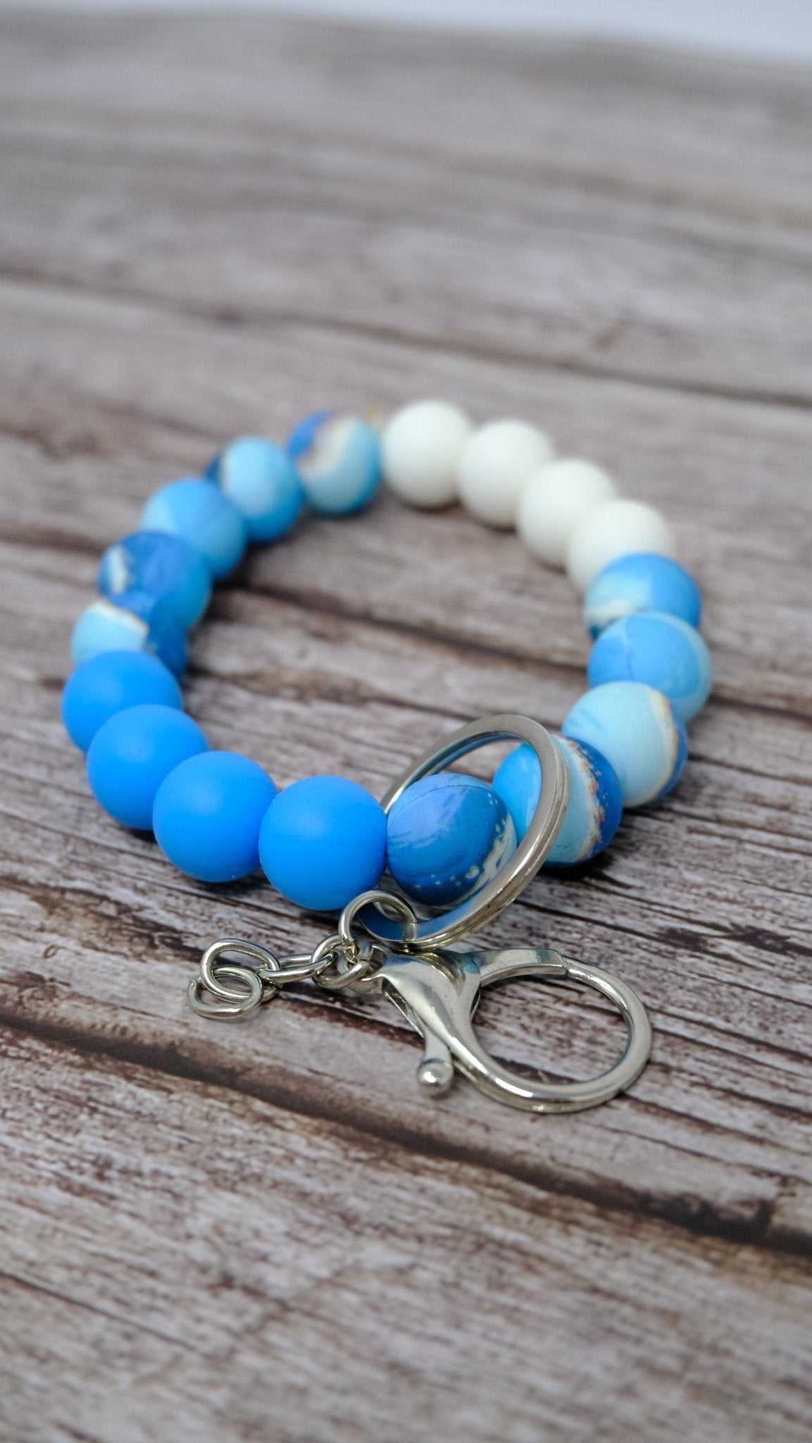 Blue Ocean Beaded Wristlet keychain with silicone blue and white beads and silver lobster clasp