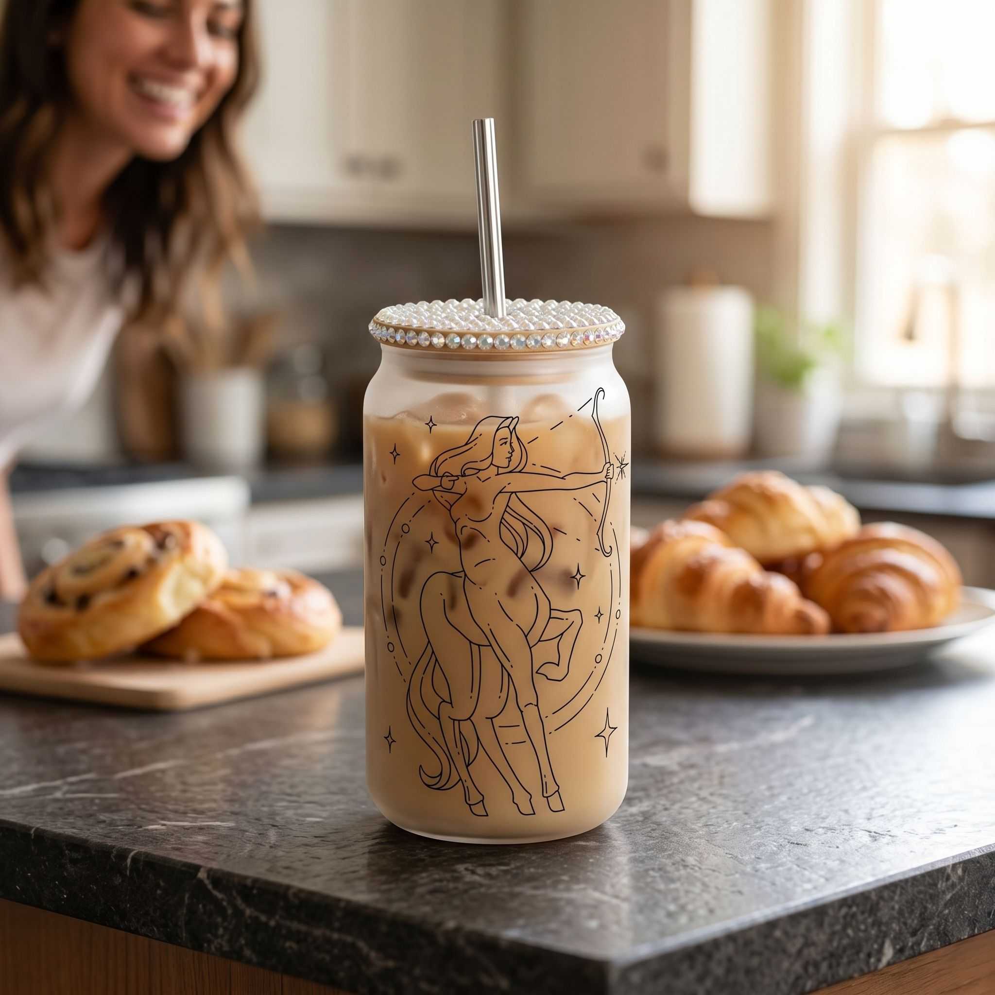 Close-up of 16oz clear Libby glass beer can cup filled with beverage, highlighting zodiac stars design and textured surface.