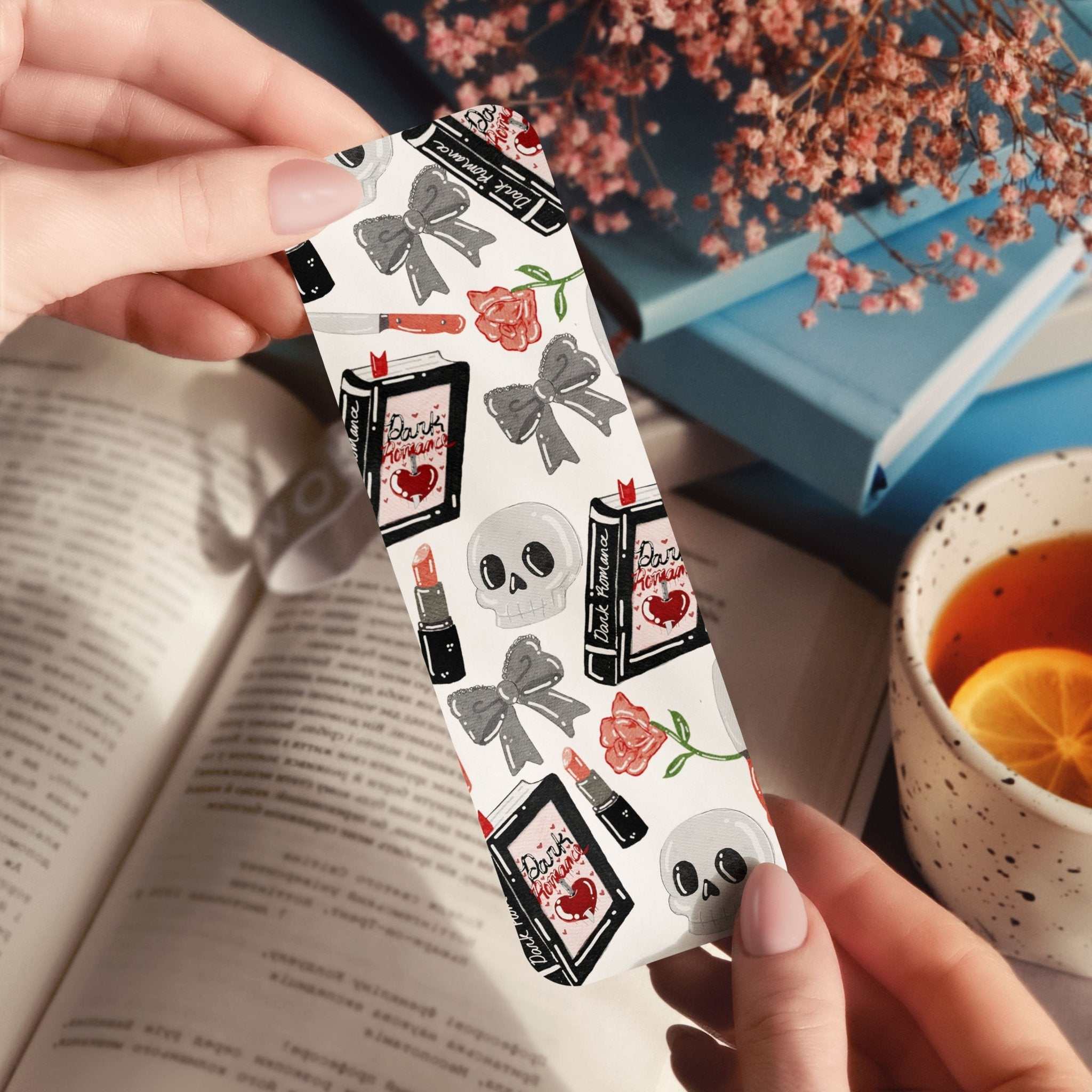 Dark Romance Skulls bookmark with gothic skulls, vintage books, and candles in dark romance style
