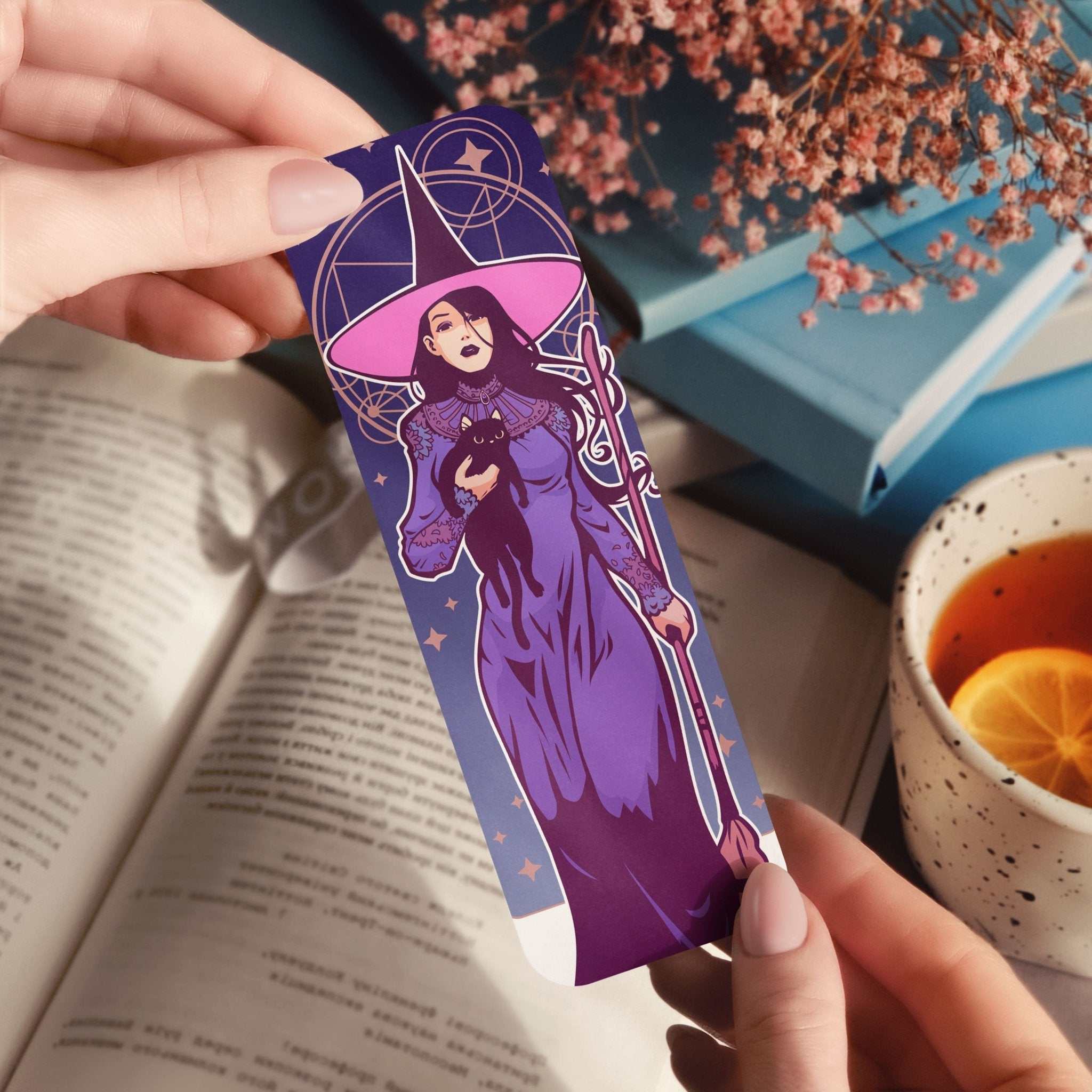 Elegant witch bookmark with black cat, broomstick, and gothic mystical design
