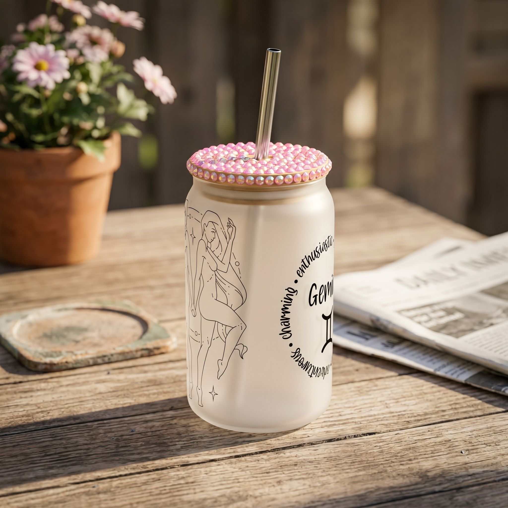 16 oz Gemini zodiac Libby glass beer can cup on rustic wooden table in outdoor setting, showcasing sublimated zodiac design and casual vibe.