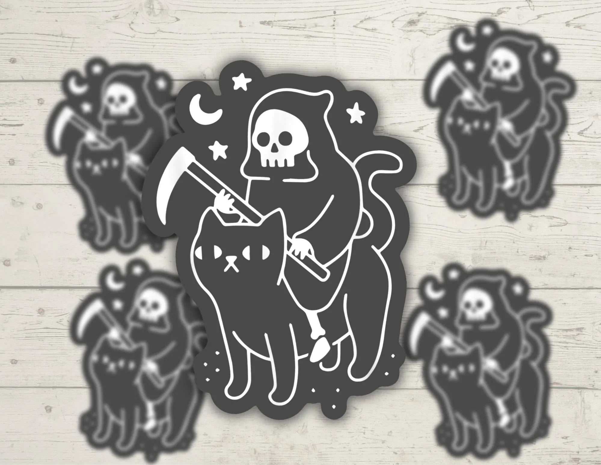 Grim Reaper on a black cat vinyl sticker with bold, durable design
