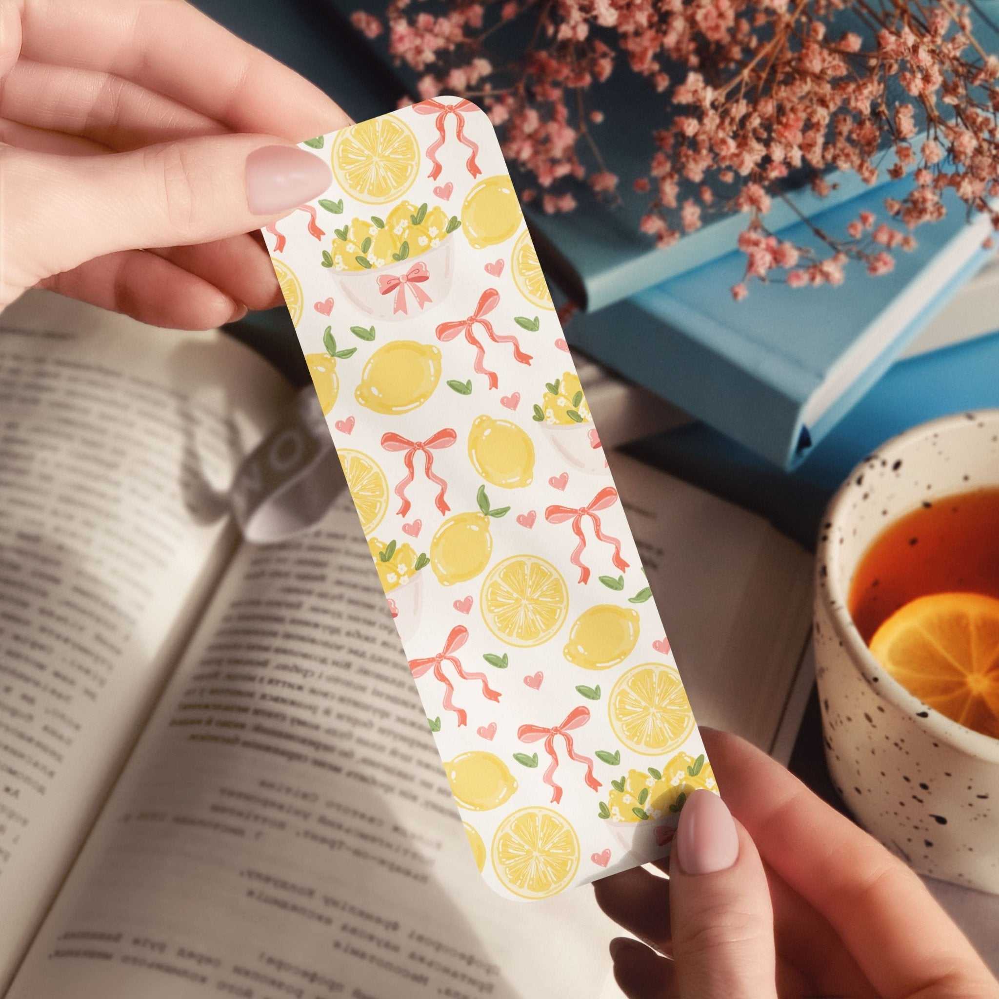 Lemons and Bows Bookmark with delicate lemons, hearts, and bows design in soft tones, available in glossy and holographic finishes.