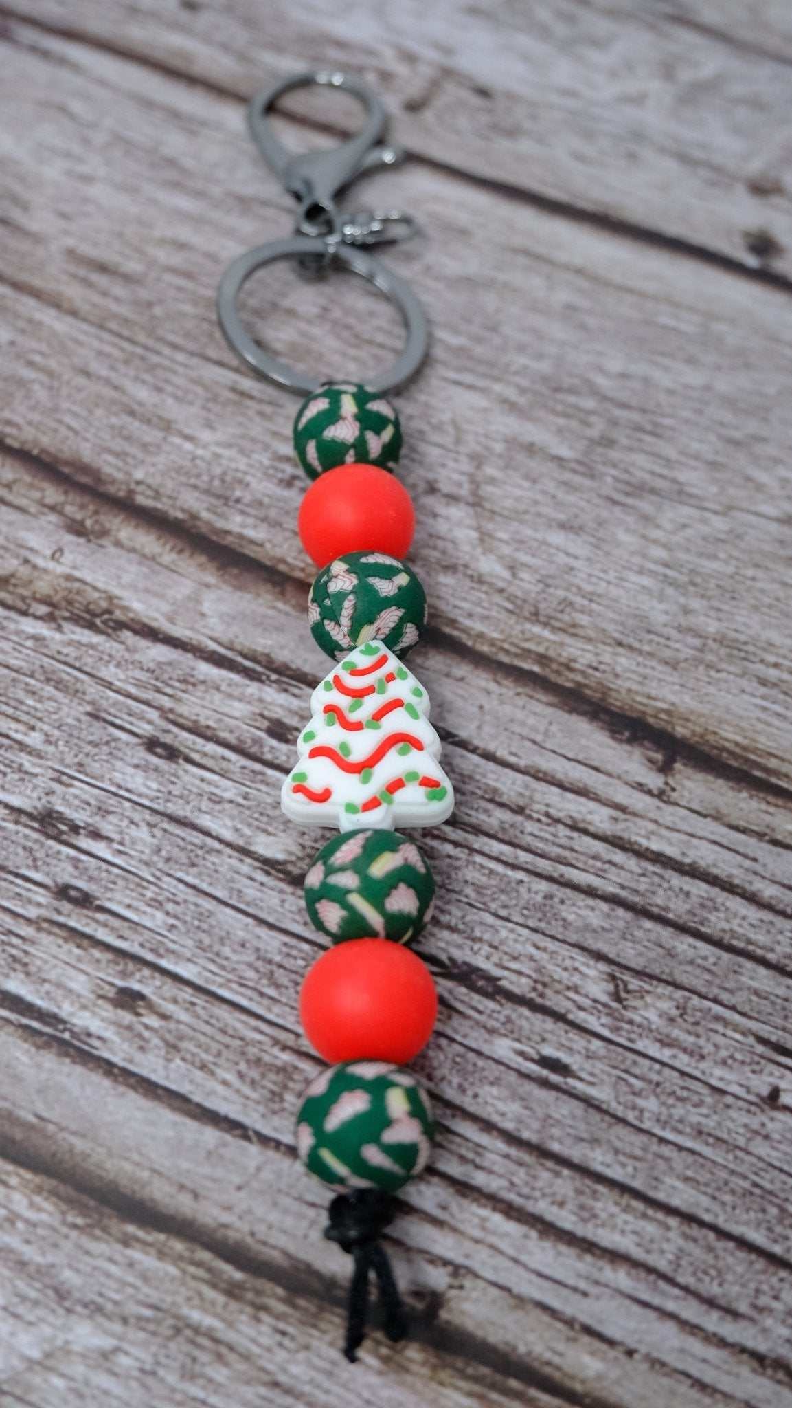Little Debbie Christmas Tree silicone beaded wristlet keychain with red and printed beads and silver lobster clasp