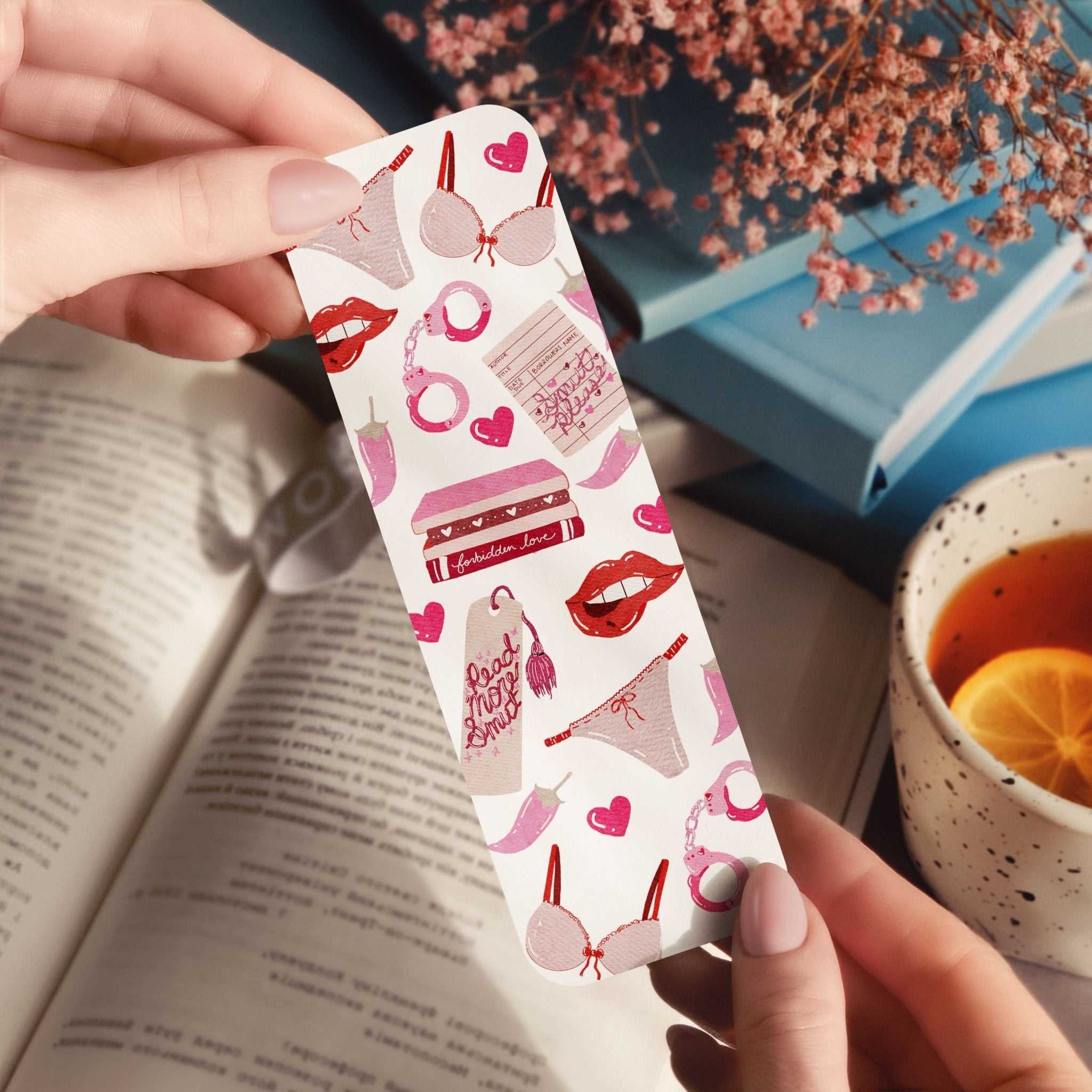 Read More Smut Bookmark with lacy undies, biting lips, handcuffs, and glossy or holographic finish