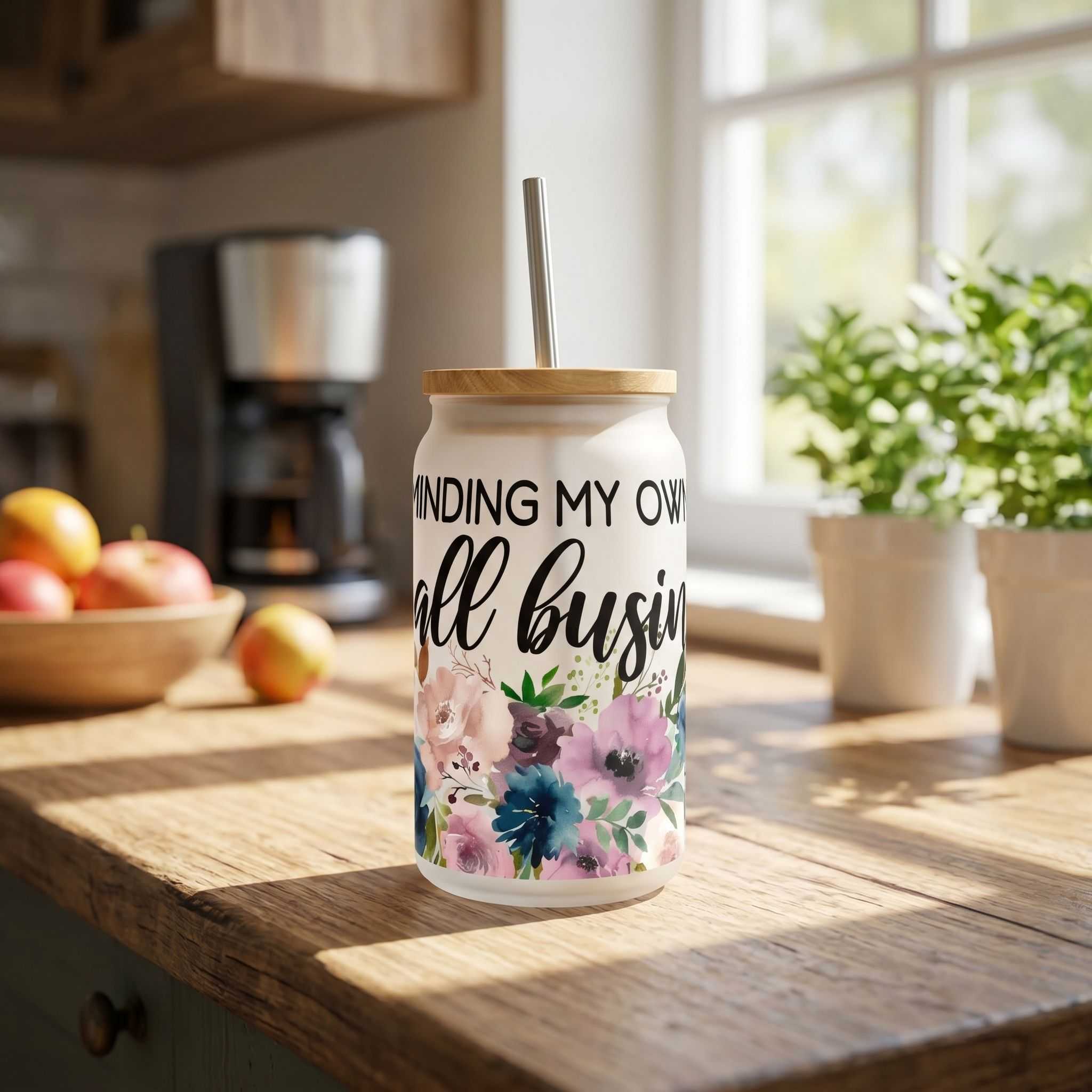 16 oz floral Libby glass beer can cup in a casual kitchen, sunlight, rustic countertop, joyful vibe.