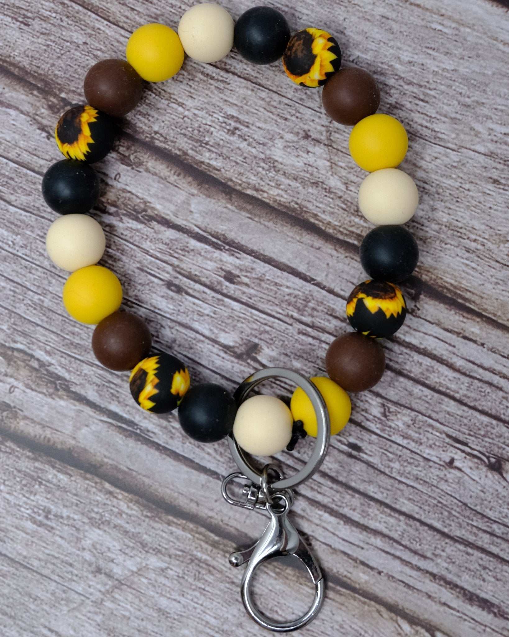 Sunflower black and yellow beaded wristlet keychain with silicone beads and lobster clasp