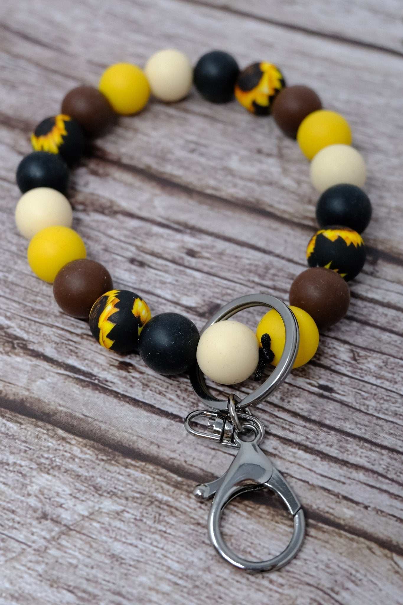Sunflower black and yellow beaded wristlet keychain with silicone beads and silver lobster clasp