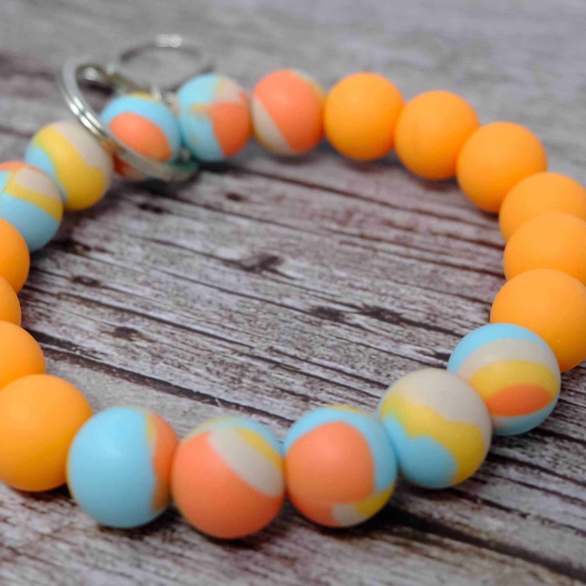 Tangerine colorful beaded wristlet keychain with silicone beads and silver lobster clasp